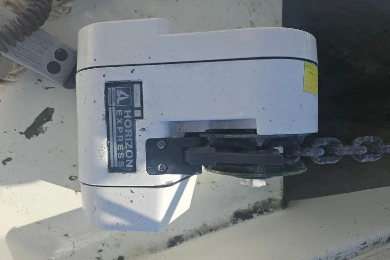 Slide: The Image of Horizon Express windlass on 1998 Beneteau 381 sailboat deck. - 62
