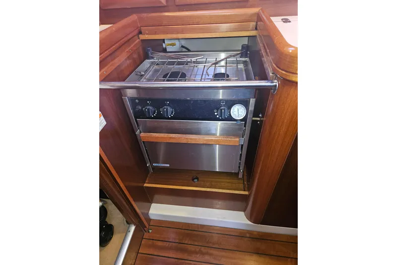 Slide: The Image of Galley stove and oven in 1998 Beneteau 381 sailboat kitchen. - 29