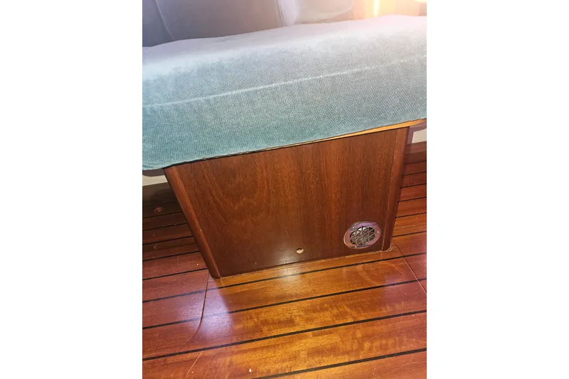 Slide: The Image of Victron Energy control panel on 1998 Beneteau 381, displaying charger and inverter settings. - 42