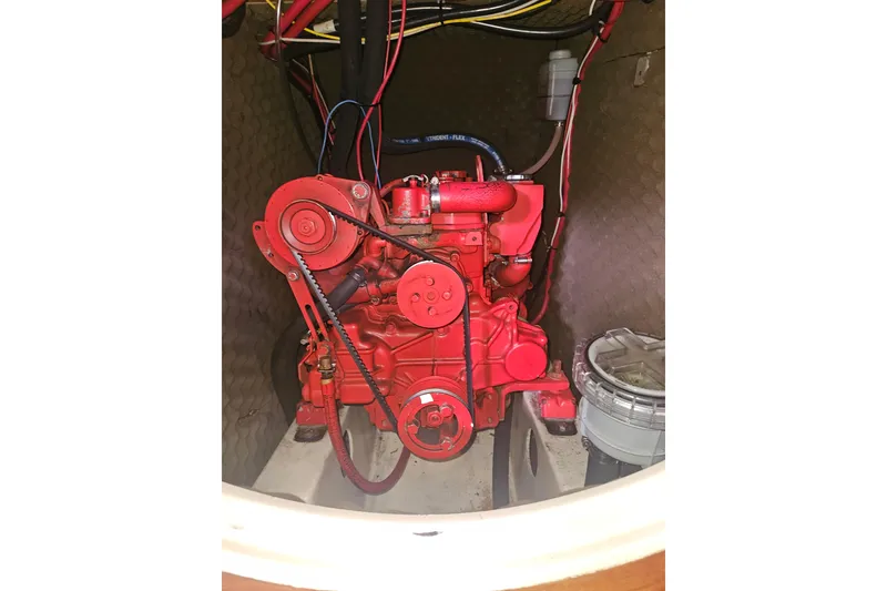 Slide: The Image of Cockpit of 1998 Beneteau 381 sailboat with steering wheel and navigation instruments. - 56