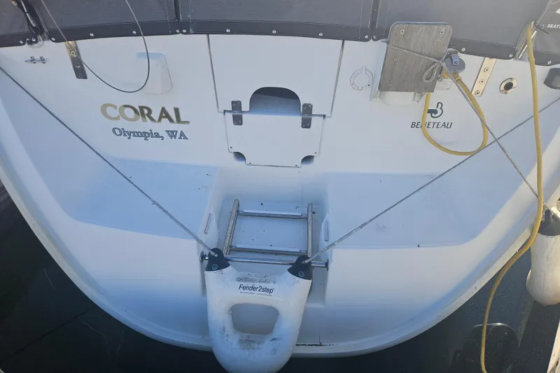 Slide: The Image of Stern view of 1998 Beneteau 381 sailboat named "Coral" in Olympia, WA. - 8