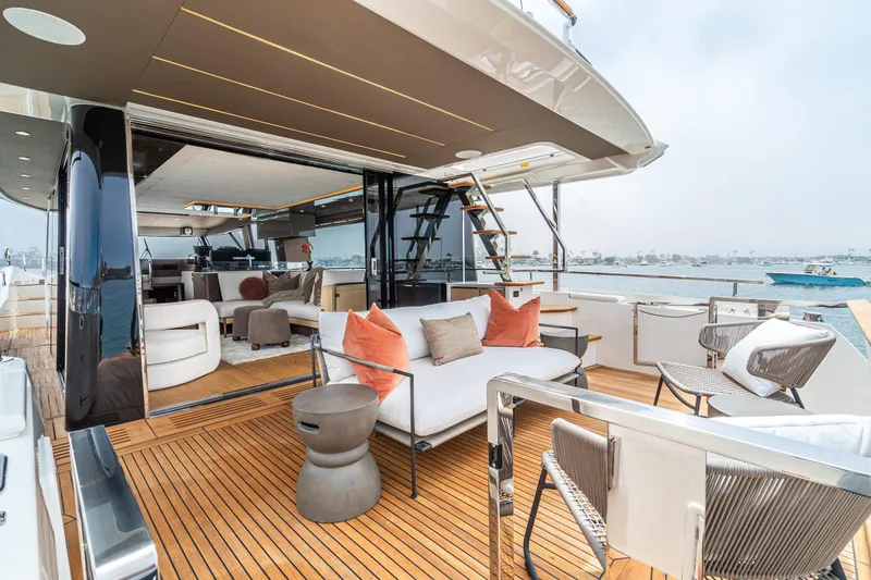 Slide: The Image of Luxurious 2024 Prestige X60 yacht deck with modern seating and ocean view. - 25