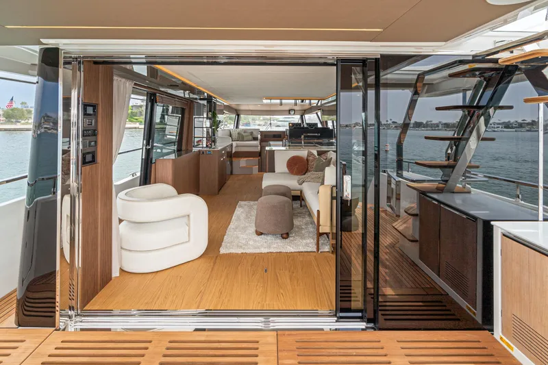 Slide: The Image of Luxurious interior of 2024 Prestige X60 yacht with modern furnishings and scenic water view. - 30