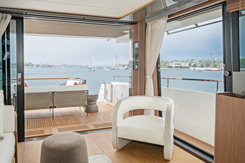 Slide: The Image of Luxurious interior of 2024 Prestige X60 yacht with scenic ocean view. - 31