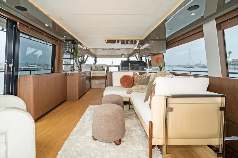 Slide: The Image of Luxurious interior of 2024 Prestige X60 yacht with modern furnishings and panoramic windows. - 32