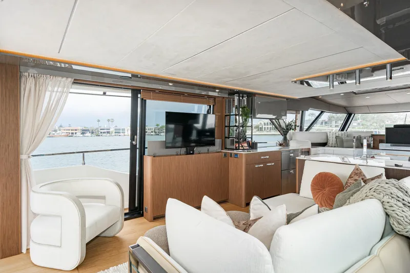 Slide: The Image of Luxurious interior of 2024 Prestige X60 yacht with modern furnishings and panoramic windows. - 33