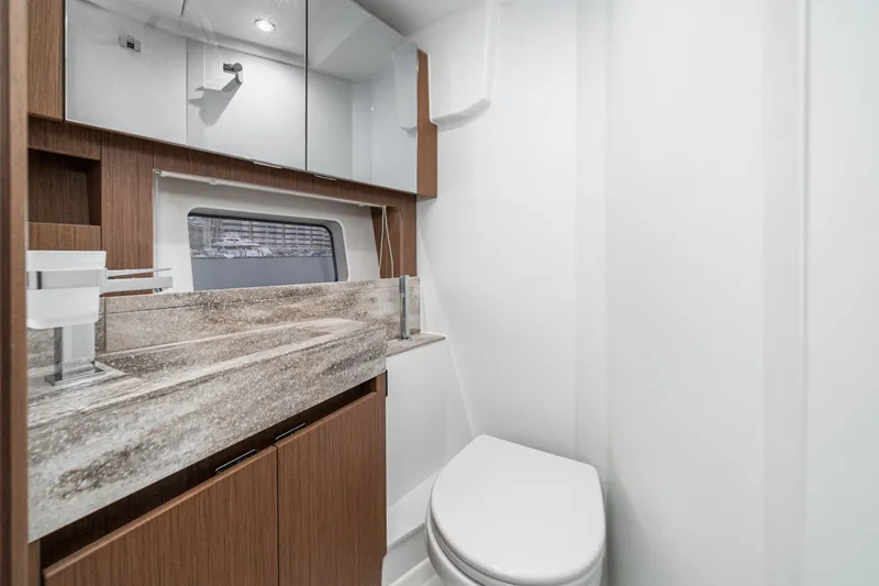 Slide: The Image of Luxurious bathroom in 2024 Prestige X60 yacht with modern fixtures and elegant design. - 47