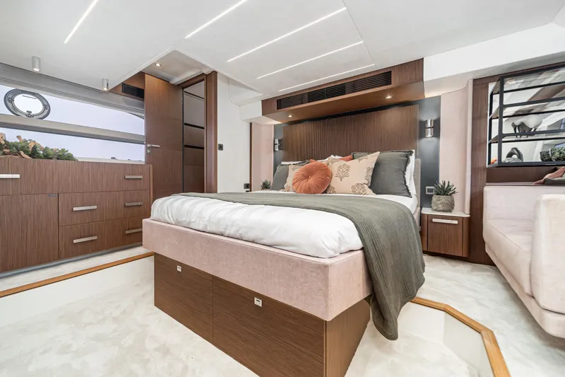 Slide: The Image of Luxurious 2024 Prestige X60 yacht bedroom with modern design and elegant decor. - 49