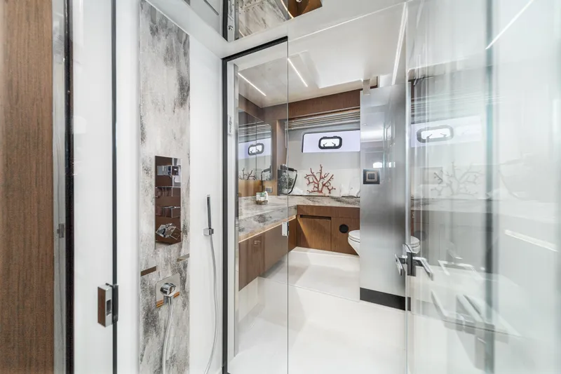 Slide: The Image of Luxurious bathroom interior of 2024 Prestige X60 yacht with modern fixtures and elegant design. - 54