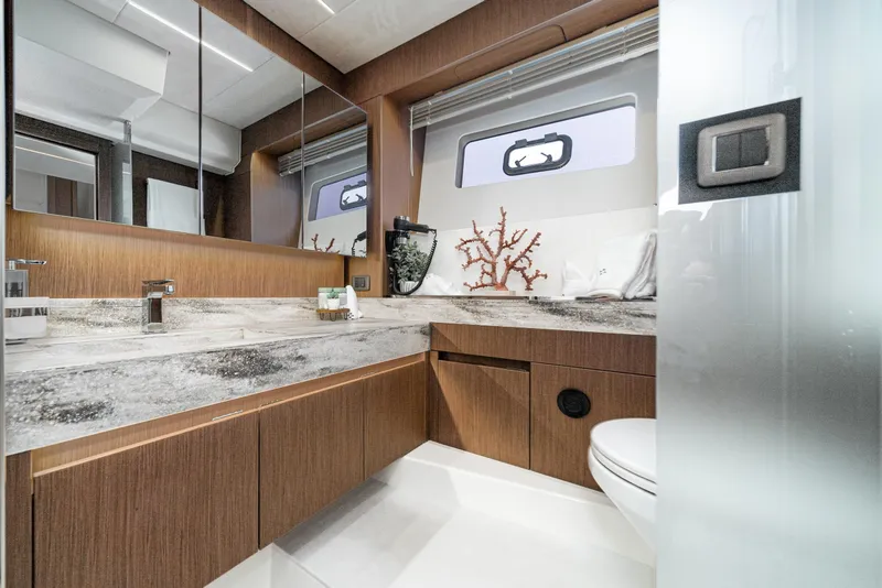 Slide: The Image of Luxurious bathroom in 2024 Prestige X60 yacht with modern fixtures and elegant design. - 55