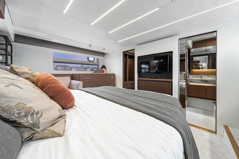 Slide: The Image of Luxurious bedroom interior of 2024 Prestige X60 yacht with modern design and elegant furnishings. - 56