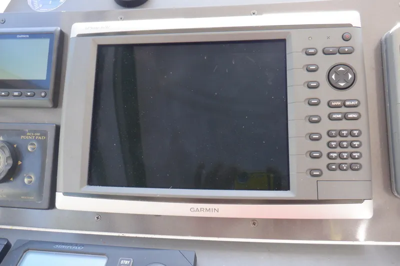 Slide: The Image of Luxurious interior of 2001 Linssen DS 45 yacht with cream leather seating and wooden table. - 28