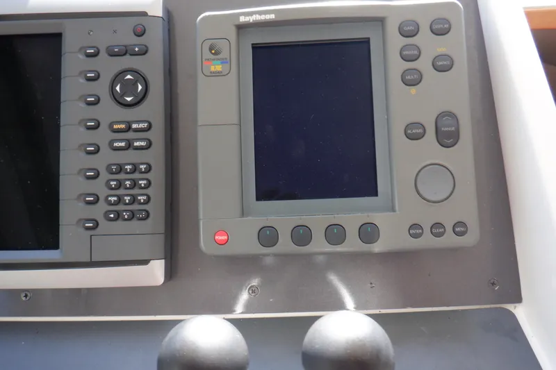 Slide: The Image of Interior of 2001 Linssen DS 45 yacht with seating, table, and kitchenette. - 29