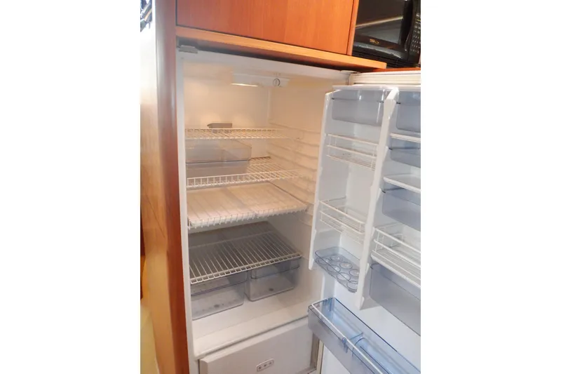 Slide: The Image of Luxurious interior of 2001 Linssen DS 45 yacht with wood paneling and modern amenities. - 36