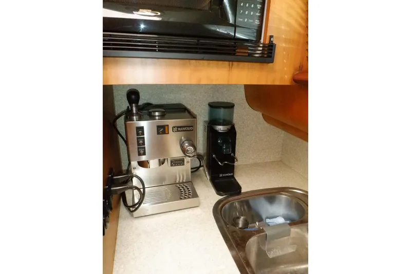 Slide: The Image of Interior of 2001 Linssen DS 45 yacht with wooden bunk beds and nautical-themed bedding. - 38