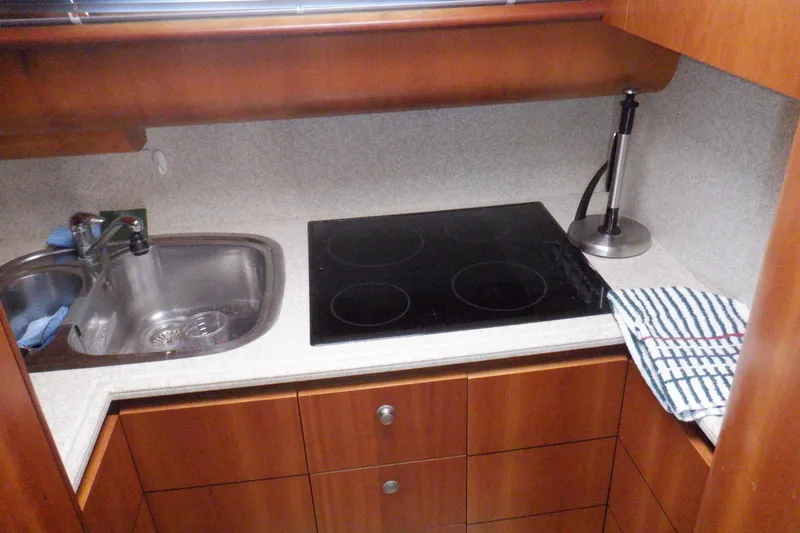 Slide: The Image of Interior of 2001 Linssen DS 45 yacht with wood paneling and modern amenities. - 40