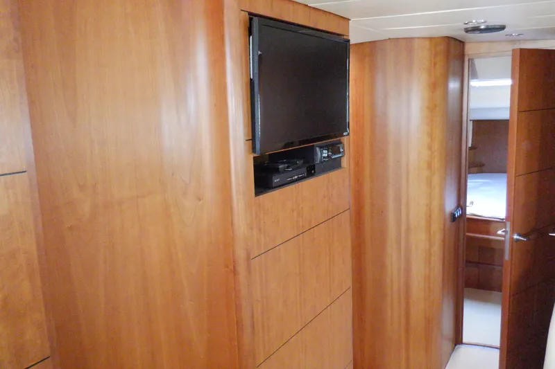 Slide: The Image of Linssen DS 45 yacht kitchen interior, featuring wood cabinetry and modern appliances, 2001 model. - 41