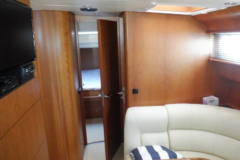 Slide: The Image of Compact kitchen in 2001 Linssen DS 45 yacht with sink, stove, and wooden cabinetry. - 42