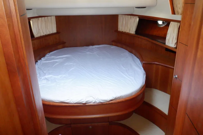 Slide: The Image of Interior of 2001 Linssen DS 45 yacht with wood paneling and compact kitchen area. - 43