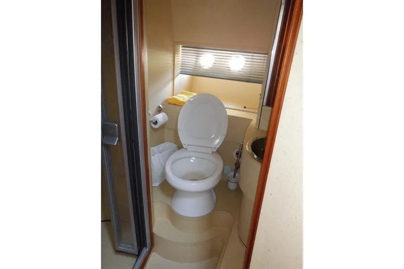 Slide: The Image of Luxurious interior of 2001 Linssen DS 45 yacht with cozy seating and compact bathroom. - 45