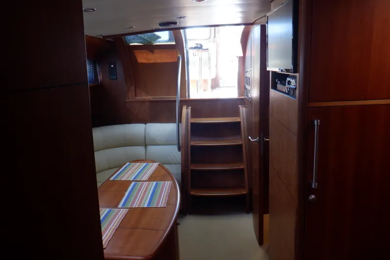 Slide: The Image of Luxurious cabin interior of 2001 Linssen DS 45 yacht with cozy bedding and wood finish. - 52