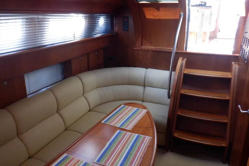 Slide: The Image of Interior of 2001 Linssen DS 45 yacht showing bathroom with wooden finishes. - 54