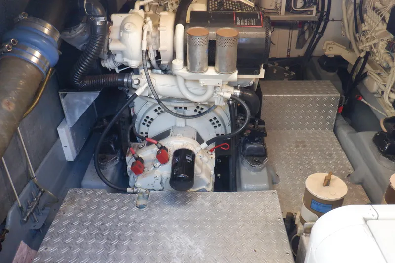 Slide: The Image of Electrical panel inside a 2001 Linssen DS 45 yacht, featuring organized wiring and cozy interior. - 58