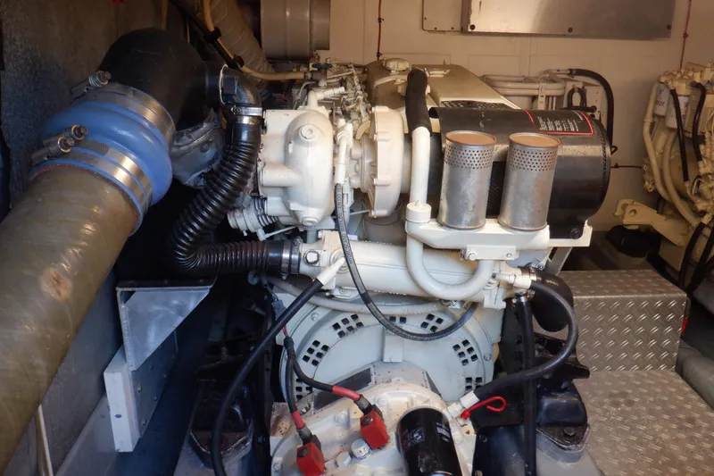 Slide: The Image of 2001 Linssen DS 45 yacht with open engine compartment and seating area. - 59