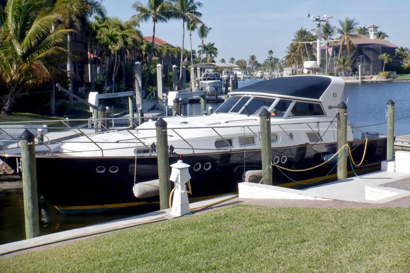 Slide: The Image of Engine room of 2001 Linssen DS 45 yacht, featuring dual engines and mechanical components. - 63