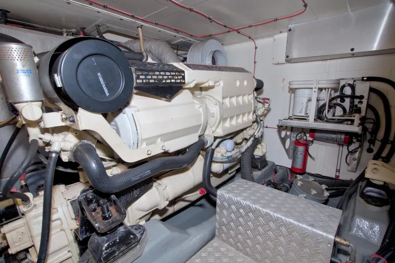Slide: The Image of Engine room of 2001 Linssen DS 45 yacht, featuring detailed mechanical components. - 64