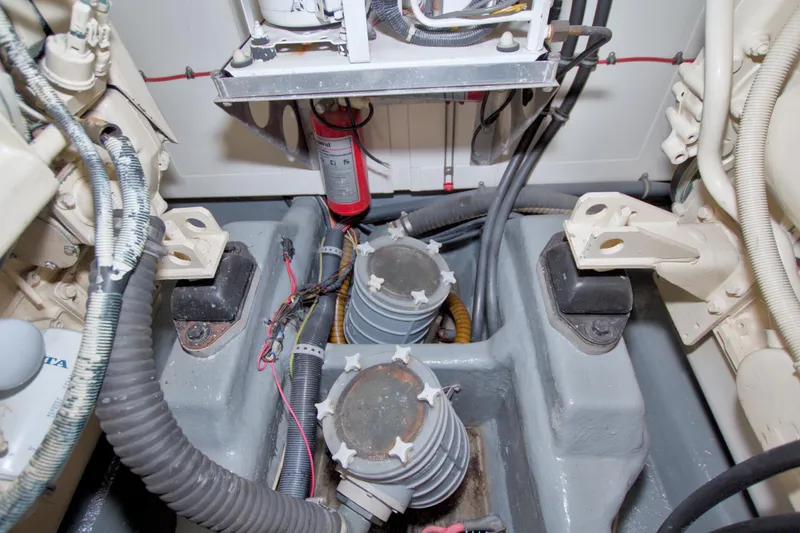 Slide: The Image of Engine room of 2001 Linssen DS 45 yacht, featuring mechanical components and wiring. - 66