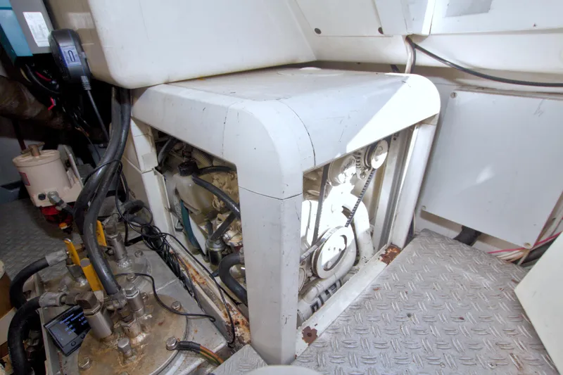 Slide: The Image of Engine room of 2001 Linssen DS 45 yacht, showcasing mechanical components and wiring. - 71