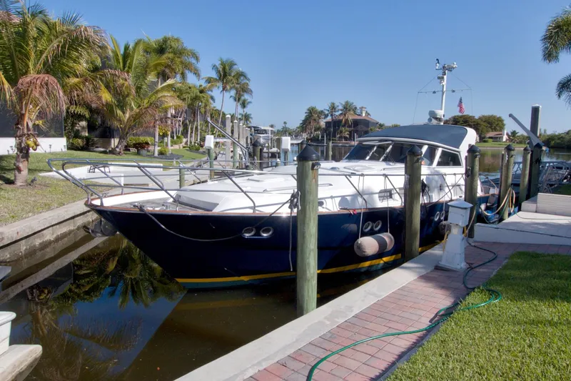 Slide: The Image of Linssen DS 45 yacht docked by palm trees, 2001 model, sunny day. - 75