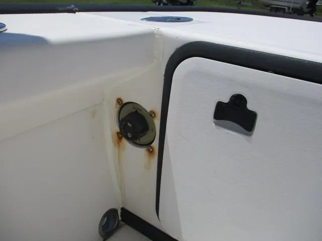 Slide: The Image of Close-up of a 2002 Everglades 250 Center Console boat. - 16