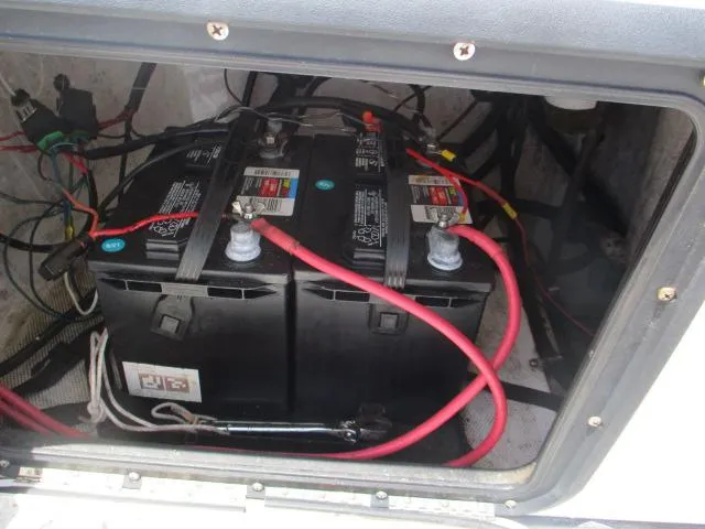 Slide: The Image of Battery compartment of a 2002 Everglades 250 Center Console boat. - 17