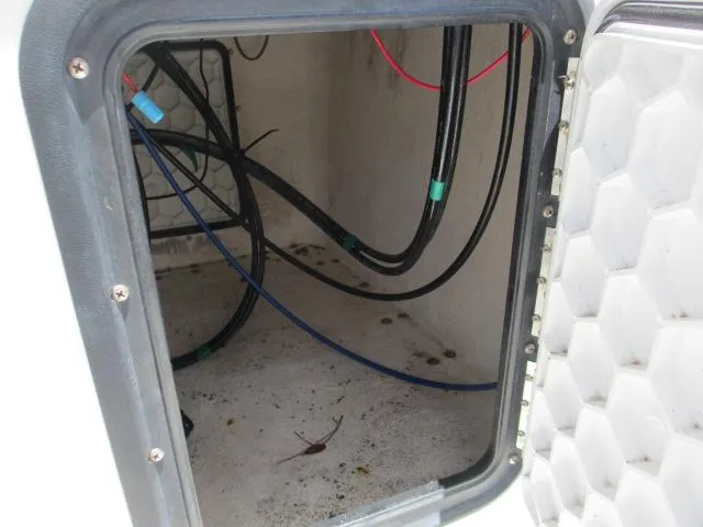 Slide: The Image of Interior of a 2002 Everglades 250 Center Console boat. - 25