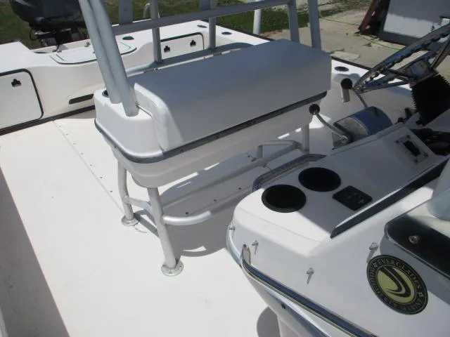 Slide: The Image of Interior view of a 2002 Everglades 250 Center Console boat. - 26