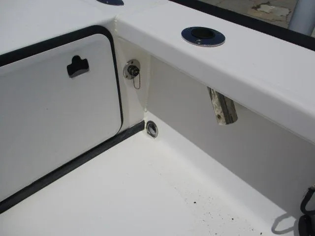 Slide: The Image of Interior view of a 2002 Everglades 250 Center Console boat. - 32