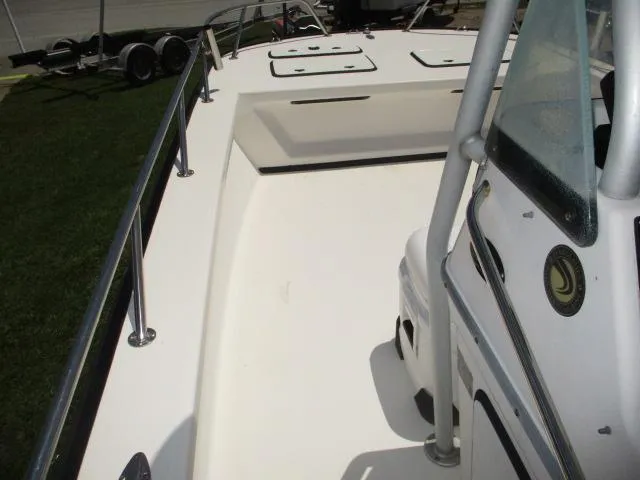 Slide: The Image of 2002 Everglades 250 Center Console boat deck with railing. - 42