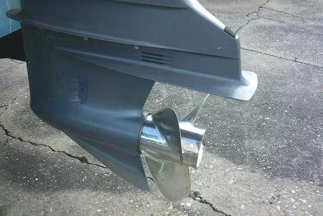 Slide: The Image of Propeller of 2002 Everglades 250 Center Console boat on concrete surface. - 56