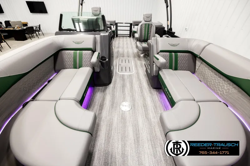 Slide: The Image of 2026 Bennington MOFBSF boat interior with luxurious seating and ambient lighting. - 13