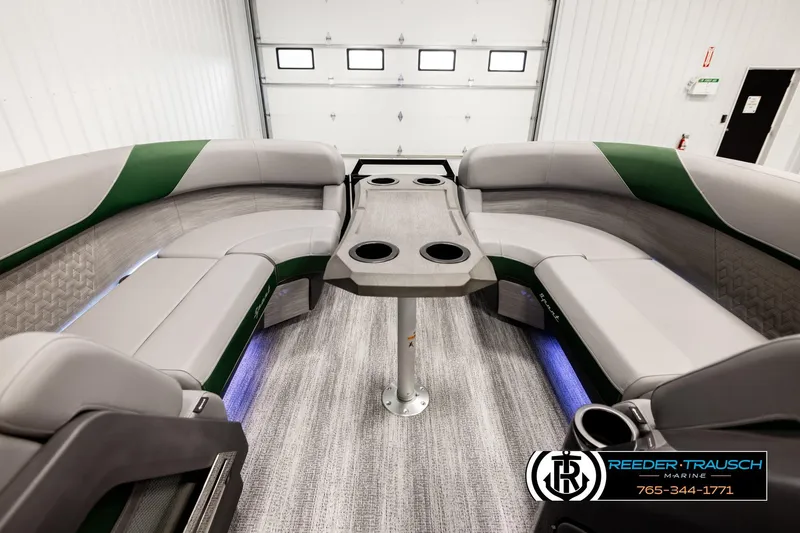 Slide: The Image of Interior of 2026 Bennington MOFBSF boat with plush seating and modern table design. - 19