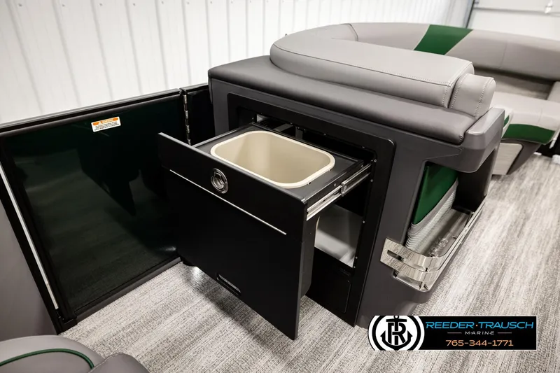 Slide: The Image of 2026 Bennington MOFBSF boat interior with built-in storage and seating. - 22