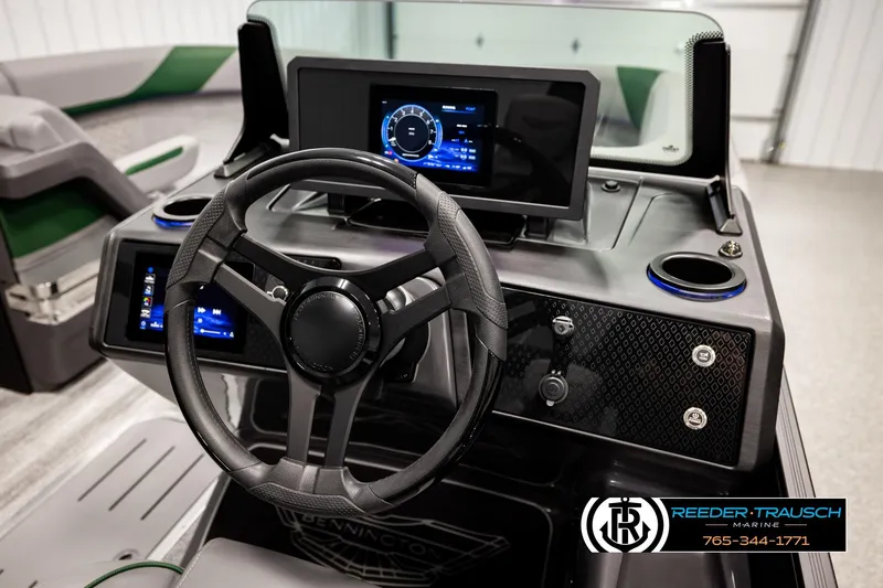 Slide: The Image of 2026 Bennington MOFBSF boat dashboard with modern steering wheel and digital displays. - 30