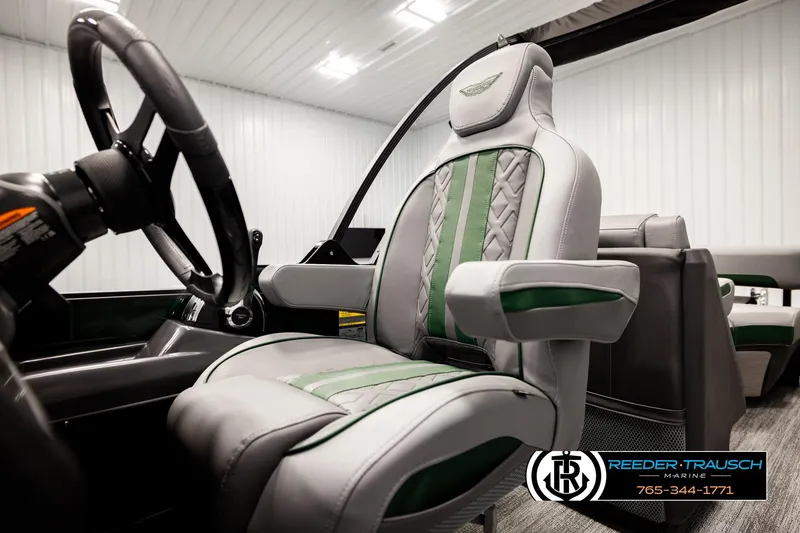 Slide: The Image of 2026 Bennington MOFBSF boat interior with luxurious seating and steering wheel. - 37
