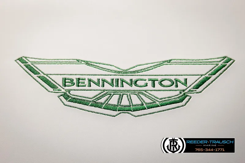 Slide: The Image of Embroidered Bennington logo on 2026 MOFBSF model, featuring Reeder-Trausch Marine branding. - 39