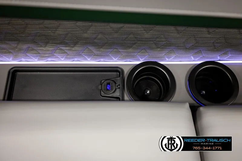 Slide: The Image of Interior of 2026 Bennington MOFBSF boat with cup holders and digital display. - 42