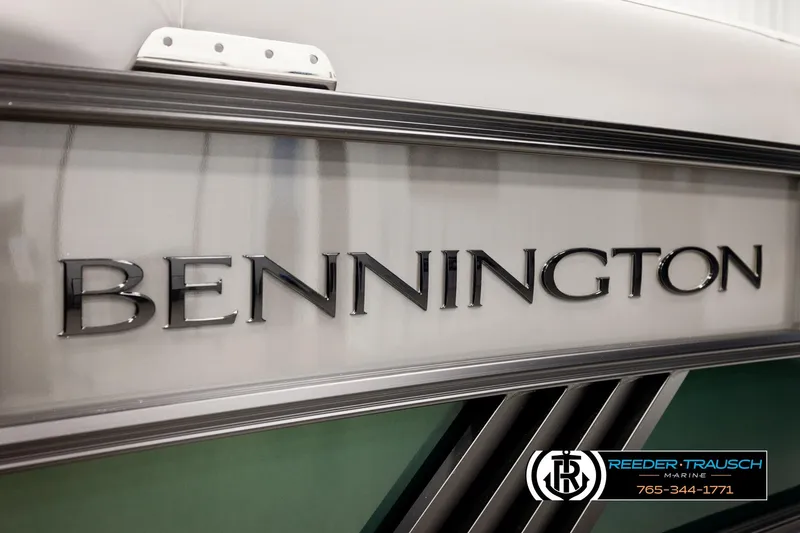 Slide: The Image of 2026 Bennington MOFBSF boat with sleek design and Reeder-Trausch Marine branding. - 45