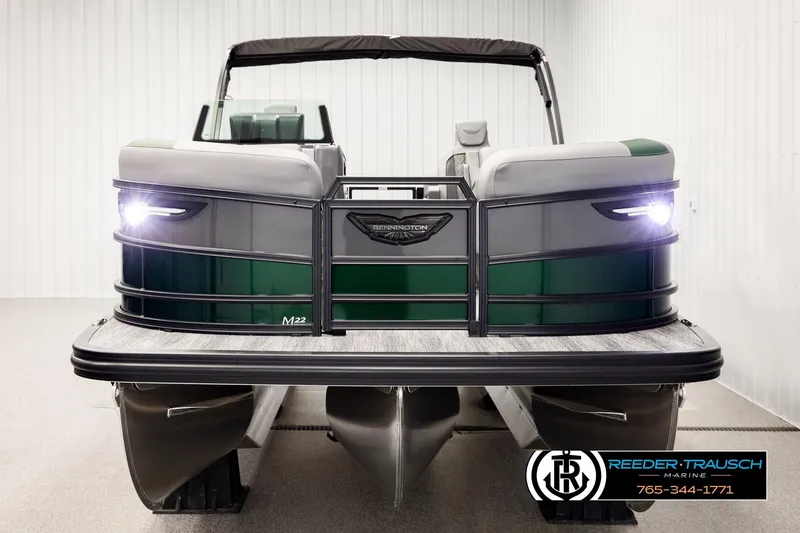 Slide: The Image of 2026 Bennington MOFBSF pontoon boat with sleek design and illuminated headlights. - 8