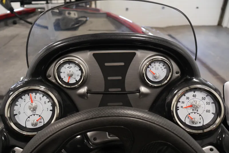 Slide: The Image of 2024 Tracker Pro Team 175 TXW dashboard with gauges and steering wheel. - 19